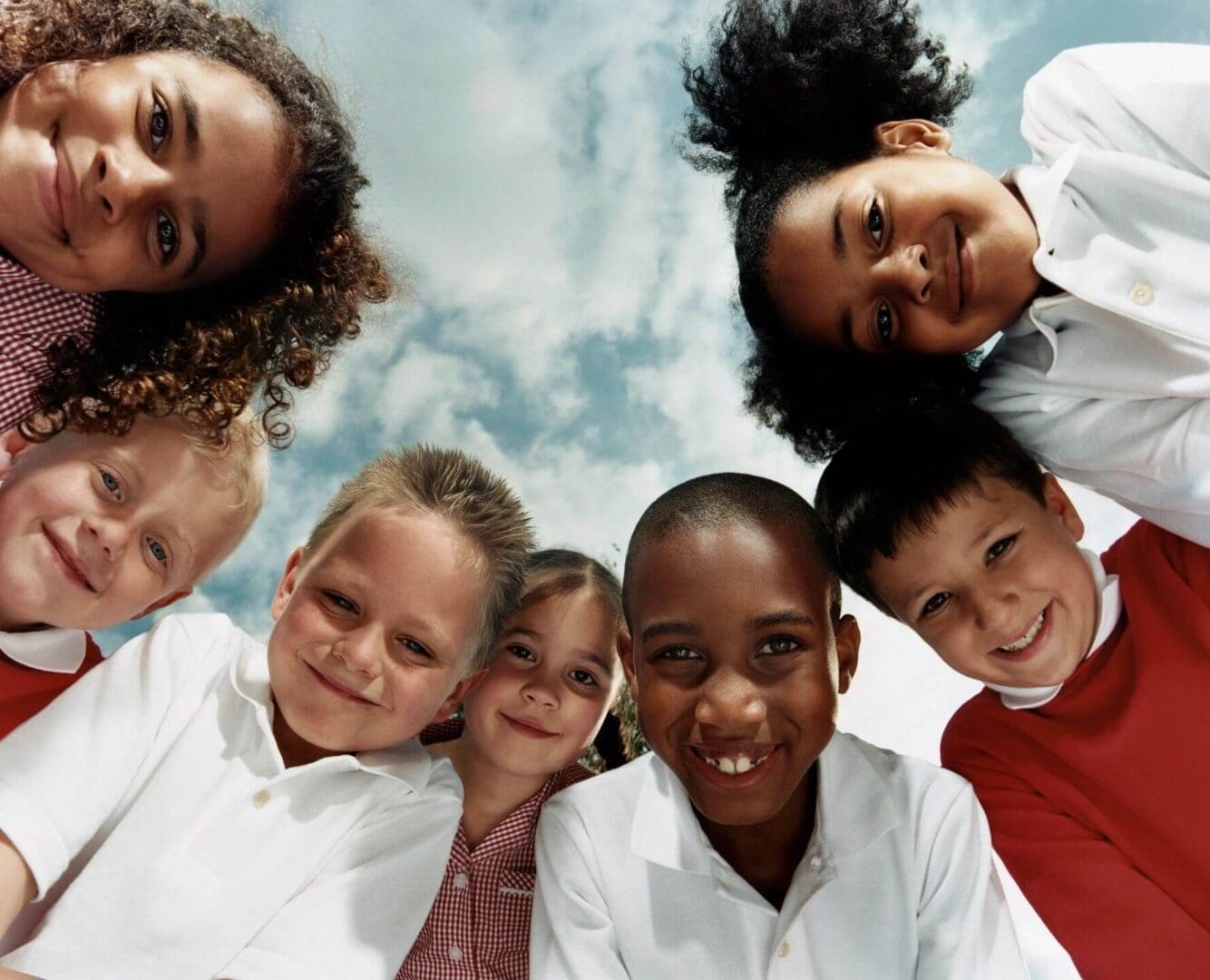 A group of children standing next to each other.