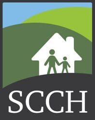 A green and white logo of a house with people.